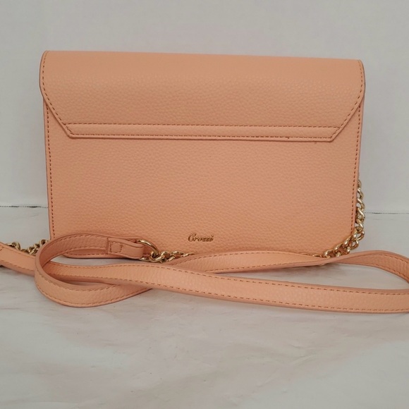 Elegant Peach Crossbody Bag with Bow Accent
NWOT - Picture 3 of 7